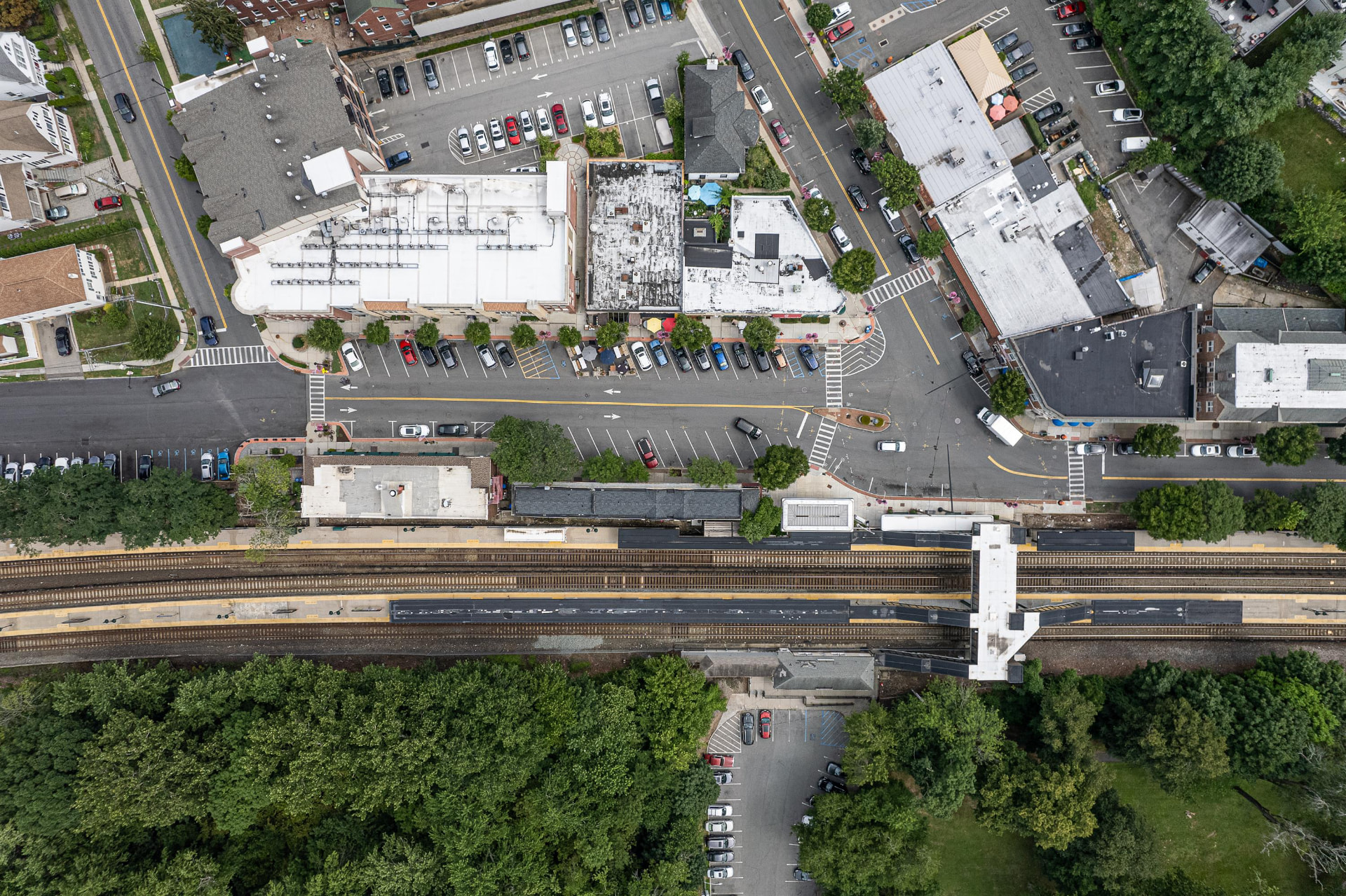 Overhead view of the Crestwood station platforms and village shops