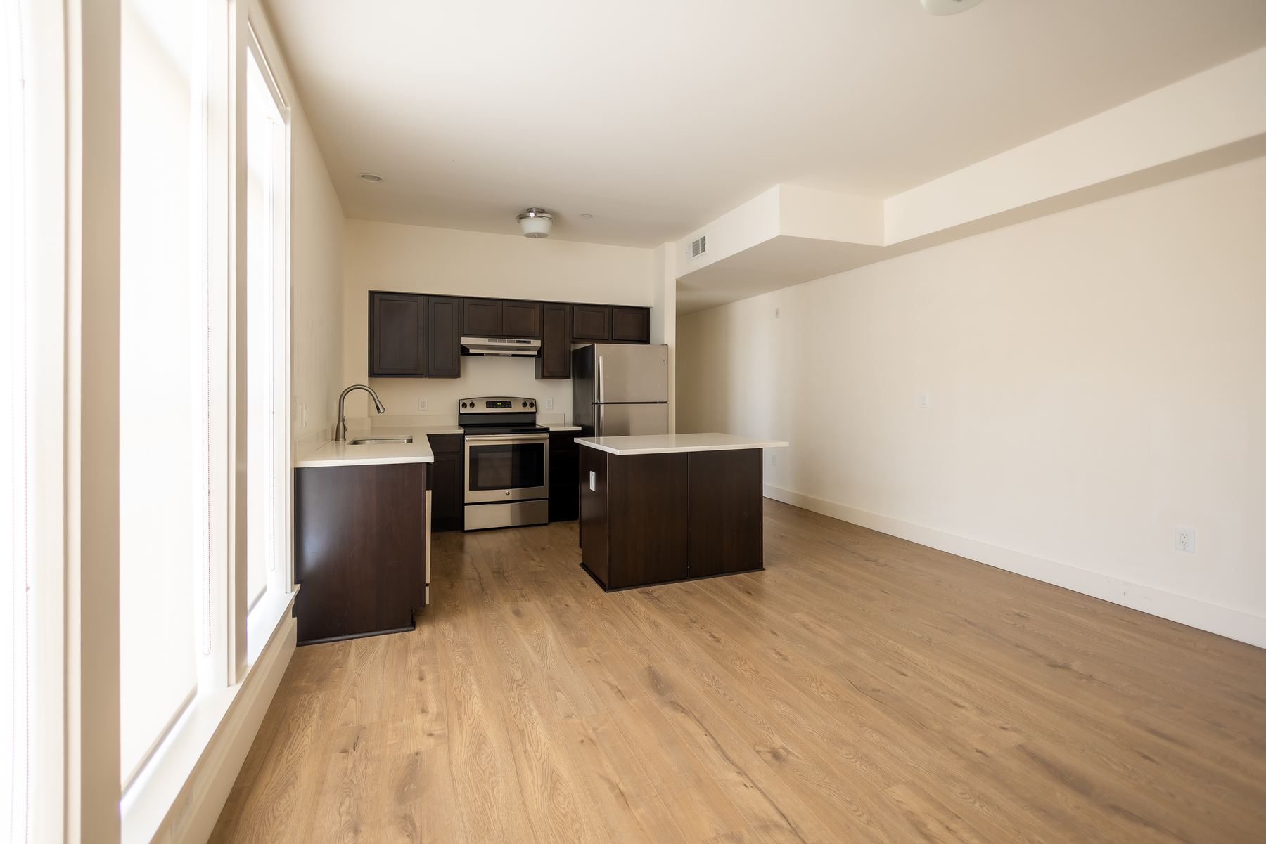 Kitchen island viewed from the entry hallway